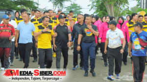 Hadiah Motor Listrik Meriahkan Jalan Sehat Hari Bhayangkara ke-79 di Polres Pesawaran